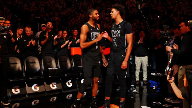 Brooklyn Nets forward Mikal Bridges (1) and forward Cameron Johnson (2)